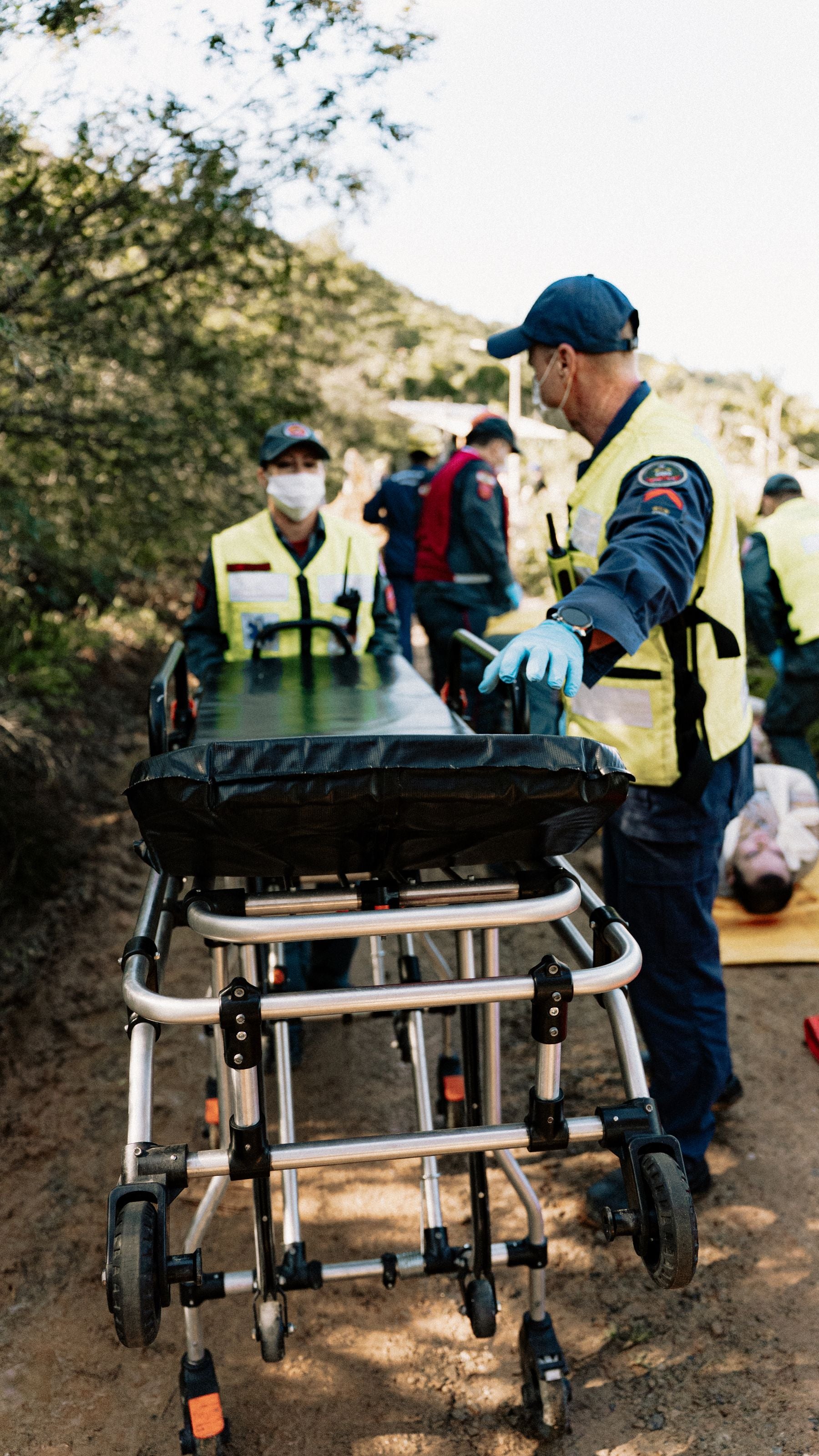 Outdoor rescue team preparing field equipment